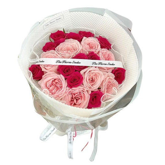 20 pink and red roses wrapped in white flower bouquet