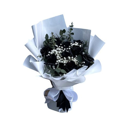 Black roses bouquet wrapped with blue paper